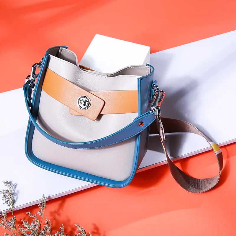 Leather Bags New Style Summer Full-grain Leather Versatile Shoulder Bag Wide Strap Shoulder Contrast Color Lady Bag 100
Leather Bags New Style Summer Full-grain Leather Versatile Shoulder Bag Wide Strap Shoulder Contrast Color Lady Bag 100
