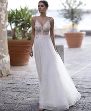 Wedding Dress A-Line V-Neck Spaghetti Straps Lace Appliques Sequined Beads Backless Floor Length Sweep Train Bride Gown 2021 
Wedding Dress A-Line V-Neck Spaghetti Straps Lace Appliques Sequined Beads Backless Floor Length Sweep Train Bride Gown 2021