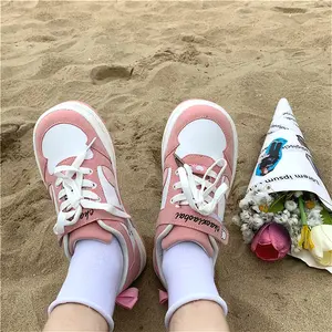 pink bow trainers