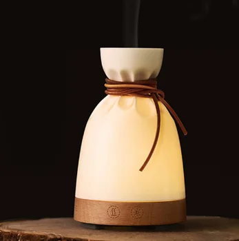 New Creative Aromatherapy Lamp Humidifier Small Cloth Bag Mini Air Purifier Gift Individual Aromatherapy Machine Home Car
New Creative Aromatherapy Lamp Humidifier Small Cloth Bag Mini Air Purifier Gift Individual Aromatherapy Machine Home Car