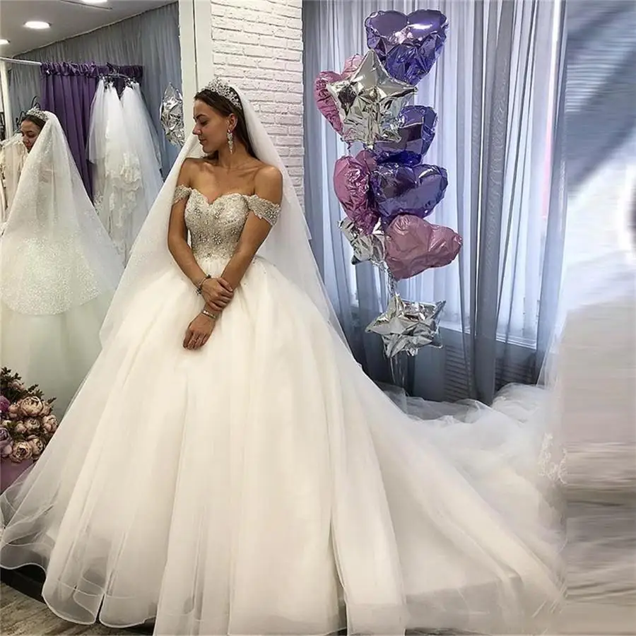 Off Shoulder Ball Gown Wedding Dresses Crystal Beaded Custom Made Lace Up Back Formal Princess Bridal Gowns Robe De Mariage
Off Shoulder Ball Gown Wedding Dresses Crystal Beaded Custom Made Lace Up Back Formal Princess Bridal Gowns Robe De Mariage