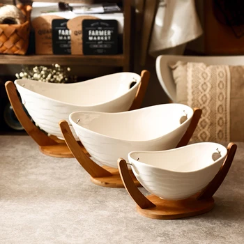 Fruit bowl ceramic bowl hotel vegetable bowl bamboo stand kitchen desktop art design storage tray
Fruit bowl ceramic bowl hotel vegetable bowl bamboo stand kitchen desktop art design storage tray