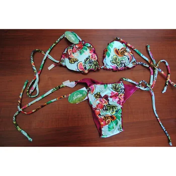 Bikini double face floral with laces woman with suitable for both sea pool triangle top with cups made in Brazil
Bikini double face floral with laces woman with suitable for both sea pool triangle top with cups made in Brazil