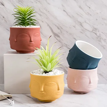 Cute Multifunction Flower Pot Home Decoration Nordic Ceramic Ornaments Face Pots Aromatherapy Candle Cup Desk Decor Figurines
Cute Multifunction Flower Pot Home Decoration Nordic Ceramic Ornaments Face Pots Aromatherapy Candle Cup Desk Decor Figurines