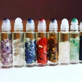 10ml Crystal Chips Inside Nature Crystal Stone Essential Oil Gemstone Roller Ball Bottle Transparent Glass with bamboo wood cap
10ml Crystal Chips Inside Nature Crystal Stone Essential Oil Gemstone Roller Ball Bottle Transparent Glass with bamboo wood cap
