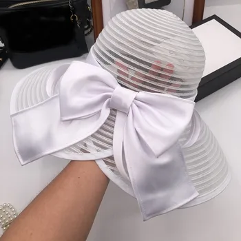 Summer new large along the sun hat female goddess of straw hat organza bowknot M the fisherman hat with the tide
Summer new large along the sun hat female goddess of straw hat organza bowknot M the fisherman hat with the tide