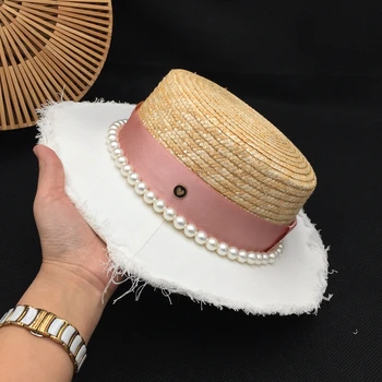 New straw patchwork straw female elegant temperament pearl travel sunshade han edition tidal flat little hat
New straw patchwork straw female elegant temperament pearl travel sunshade han edition tidal flat little hat