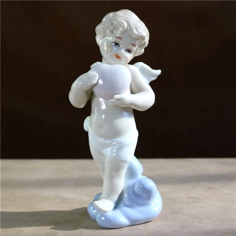 6.5'' Porcelain Love Cupid Figurine Ceramic Heart Angel Figure Miniature Tabletop Decoration Craftworks Ornament Gift Furnishing
6.5'' Porcelain Love Cupid Figurine Ceramic Heart Angel Figure Miniature Tabletop Decoration Craftworks Ornament Gift Furnishing