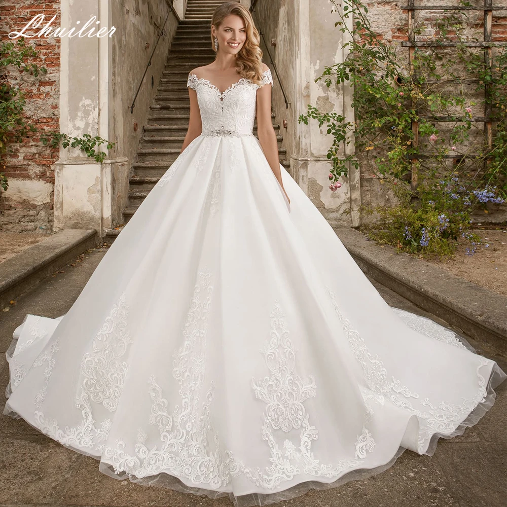 Lhuilier Elegant Women's A Line Scoop Neck Wedding Dresses Short Sleeves Floor Length Beaded Chapel Train Lace Bridal Gowns
Lhuilier Elegant Women's A Line Scoop Neck Wedding Dresses Short Sleeves Floor Length Beaded Chapel Train Lace Bridal Gowns