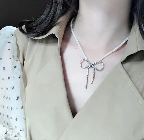 free shipping Jewelry 6-7 mm natural south sea white pearl necklace micro inlay zircon bow pendant
free shipping Jewelry 6-7 mm natural south sea white pearl necklace micro inlay zircon bow pendant