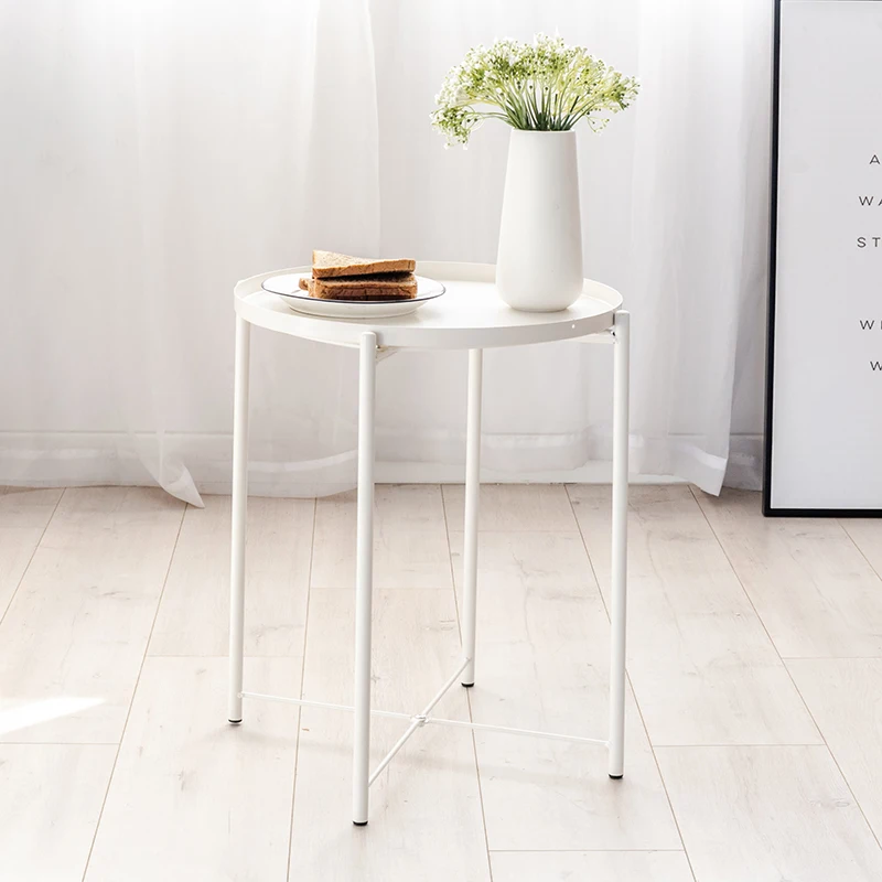Nordic tea table, simple living room, iron multi-functional table, mini simple tea table, bin Laden corner table
Nordic tea table, simple living room, iron multi-functional table, mini simple tea table, bin Laden corner table