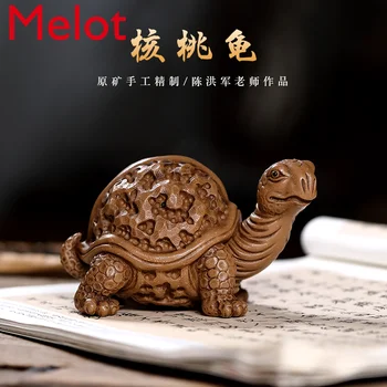 Yixing purple sand tea favorite turtle ornament famous Chen Hongjun original walnut turtle longevity turtle tea set
Yixing purple sand tea favorite turtle ornament famous Chen Hongjun original walnut turtle longevity turtle tea set