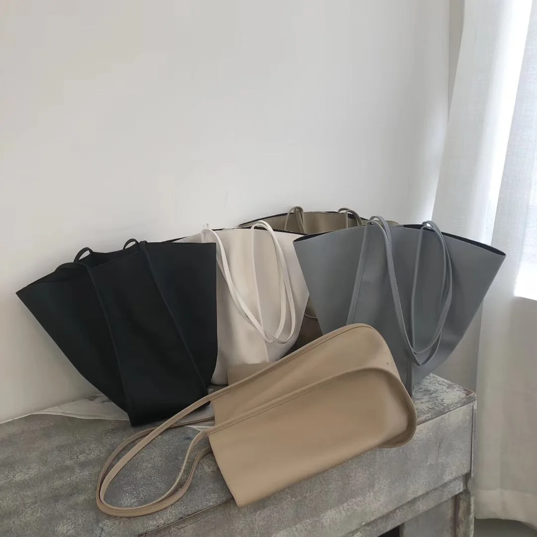 2019 new women's bag large capacity bucket bag soft surface PU simple commuter one shoulder portable tote bag shopping bag
2019 new women's bag large capacity bucket bag soft surface PU simple commuter one shoulder portable tote bag shopping bag