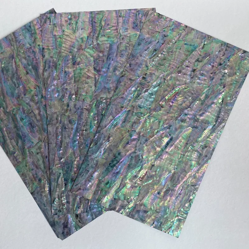 Korean black background multicolored abalone shell paper,Inlay material blank,musical instrument accessories,home crafts 
Korean black background multicolored abalone shell paper,Inlay material blank,musical instrument accessories,home crafts