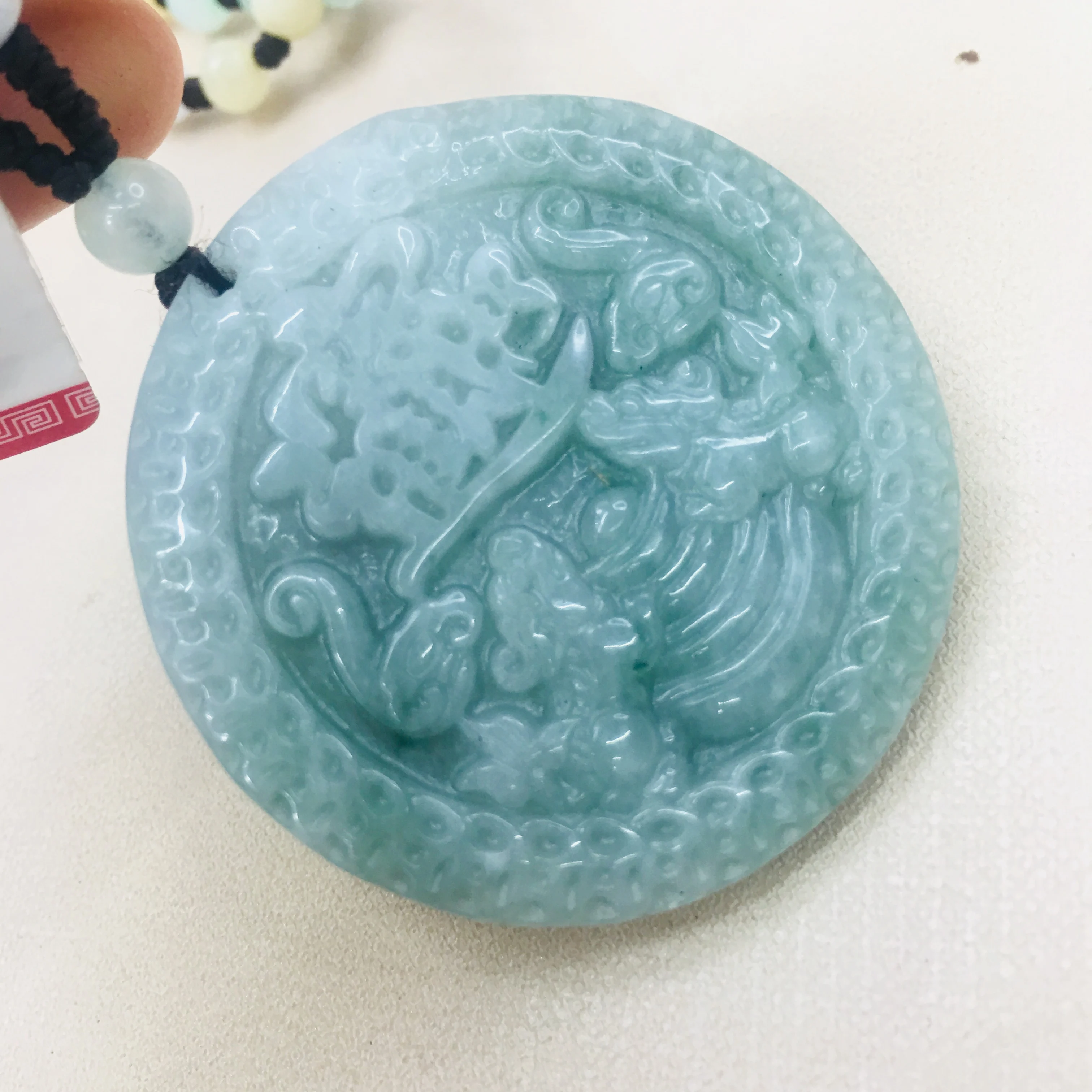Natural Burmese Emerald jade carving round good luck kylin pendant with handmade jade tri-color beads necklace male sweater chai
Natural Burmese Emerald jade carving round good luck kylin pendant with handmade jade tri-color beads necklace male sweater chai