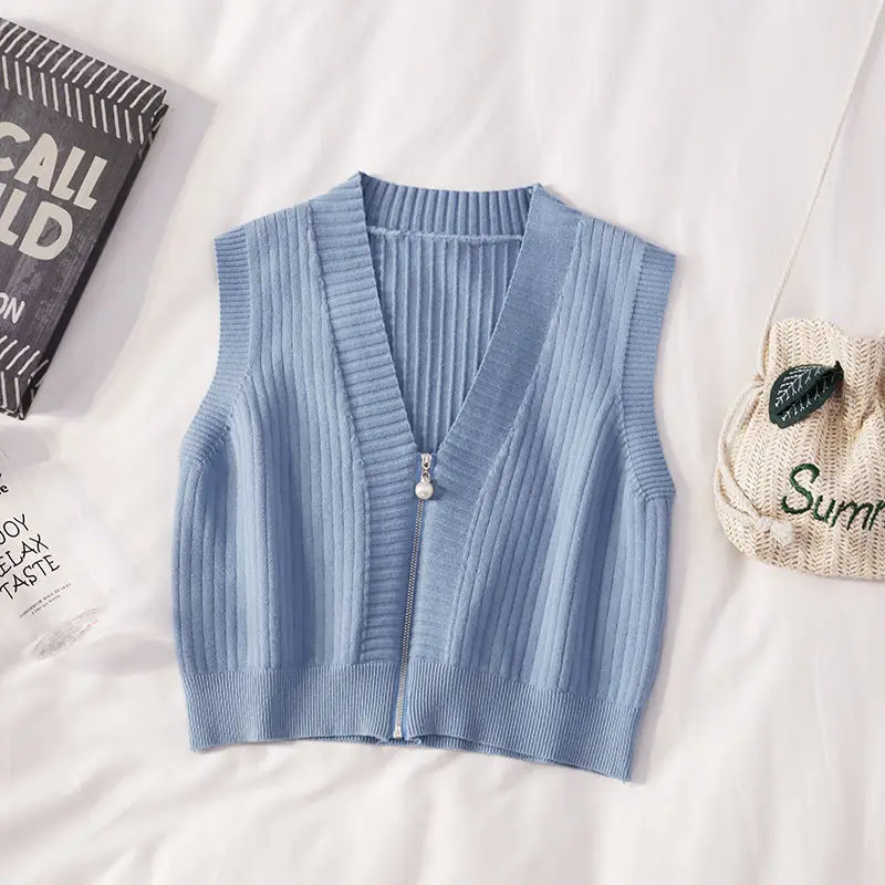 Blue 2022 Spring Korean V-neck Knit Sleeveless Sweater Short Vest Loose Coat Zipper Tops Waistcoat Lady Top Cloth for Women girl
Blue 2022 Spring Korean V-neck Knit Sleeveless Sweater Short Vest Loose Coat Zipper Tops Waistcoat Lady Top Cloth for Women girl
