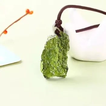 Hot Sale A++ Natural Moldavite green aerolites crystal stone pendant energy apotropaic4g-6g/ lot+ free rope Unique Necklace
Hot Sale A++ Natural Moldavite green aerolites crystal stone pendant energy apotropaic4g-6g/ lot+ free rope Unique Necklace