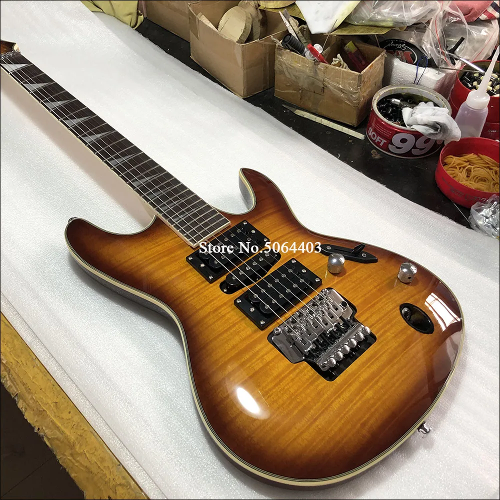 

High quality 6 string electric guitar, smoked tiger maple veneer, rosewood fingerboard, double rocking bridge, free delivery