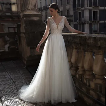 Thinyfull Glitter Princess Wedding Dresses Boho Lace Appliques Pearls Beaded Sleeve Beach A-Line Wedding Party Gowns Robe Mariee
Thinyfull Glitter Princess Wedding Dresses Boho Lace Appliques Pearls Beaded Sleeve Beach A-Line Wedding Party Gowns Robe Mariee