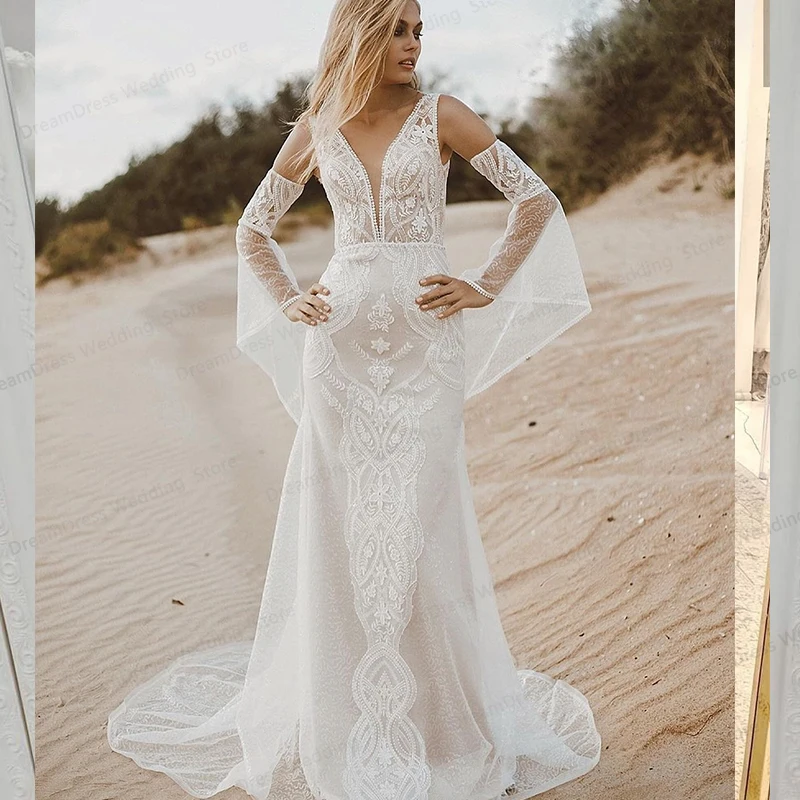 Фото Свадебное платье в стиле бохо новинка 2021 с расклешенными рукавами юбкой годе
