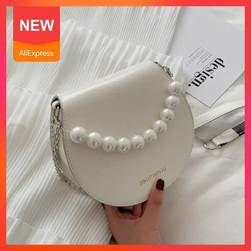 Women Pearl Handbag 2020 New Summer Fashion Mini Luxury Brand Designer Shoulder Messenger Bag Chain Crossbody Bag Semicircle Bag
Women Pearl Handbag 2020 New Summer Fashion Mini Luxury Brand Designer Shoulder Messenger Bag Chain Crossbody Bag Semicircle Bag
