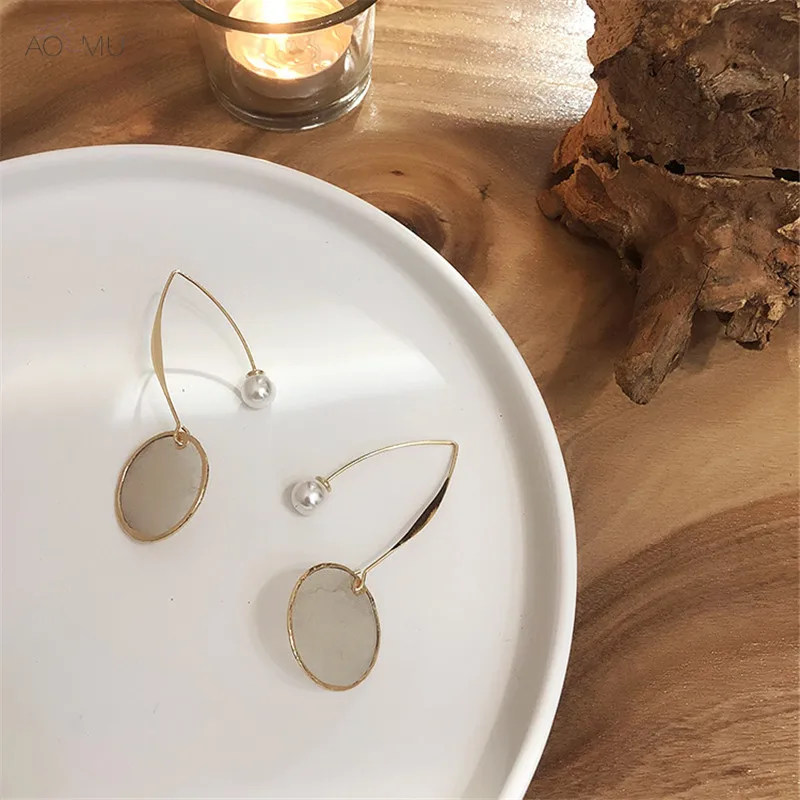 AOMU Trend Personality Metal Gold Round Circle Shell Pearl Long Drop Earrings for Dangle Women Birthday Gifts Party Jewelry
AOMU Trend Personality Metal Gold Round Circle Shell Pearl Long Drop Earrings for Dangle Women Birthday Gifts Party Jewelry