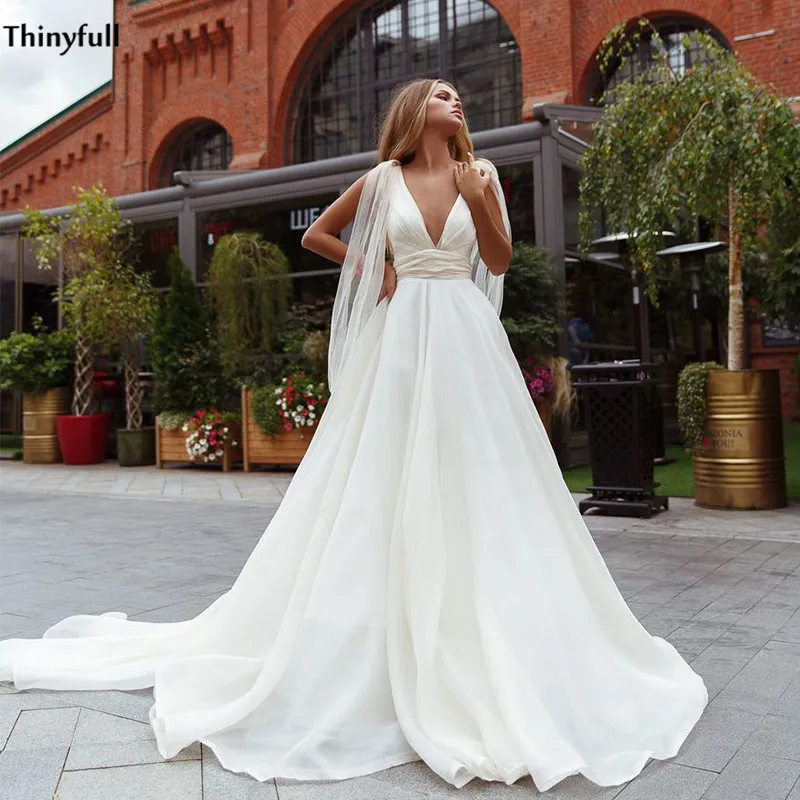 Thinyfull Sexy 2021 Wedding Dresses Deep V-Neck Backless A-Line Arabic Princdess Bridal Gowns With Straps Vestidos De Novia
Thinyfull Sexy 2021 Wedding Dresses Deep V-Neck Backless A-Line Arabic Princdess Bridal Gowns With Straps Vestidos De Novia