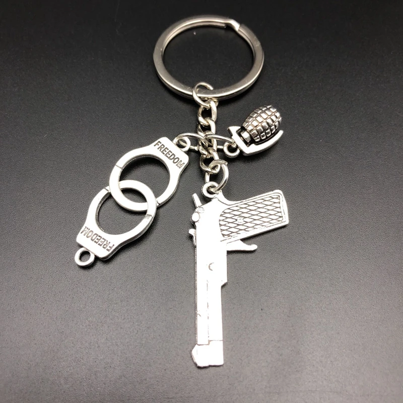 2019 Hand-matched Arms Weapon Police with Keychain Pistol Handcuffs grenad Combination Model Silver Metal Key Ring Man's Gift
2019 Hand-matched Arms Weapon Police with Keychain Pistol Handcuffs grenad Combination Model Silver Metal Key Ring Man's Gift