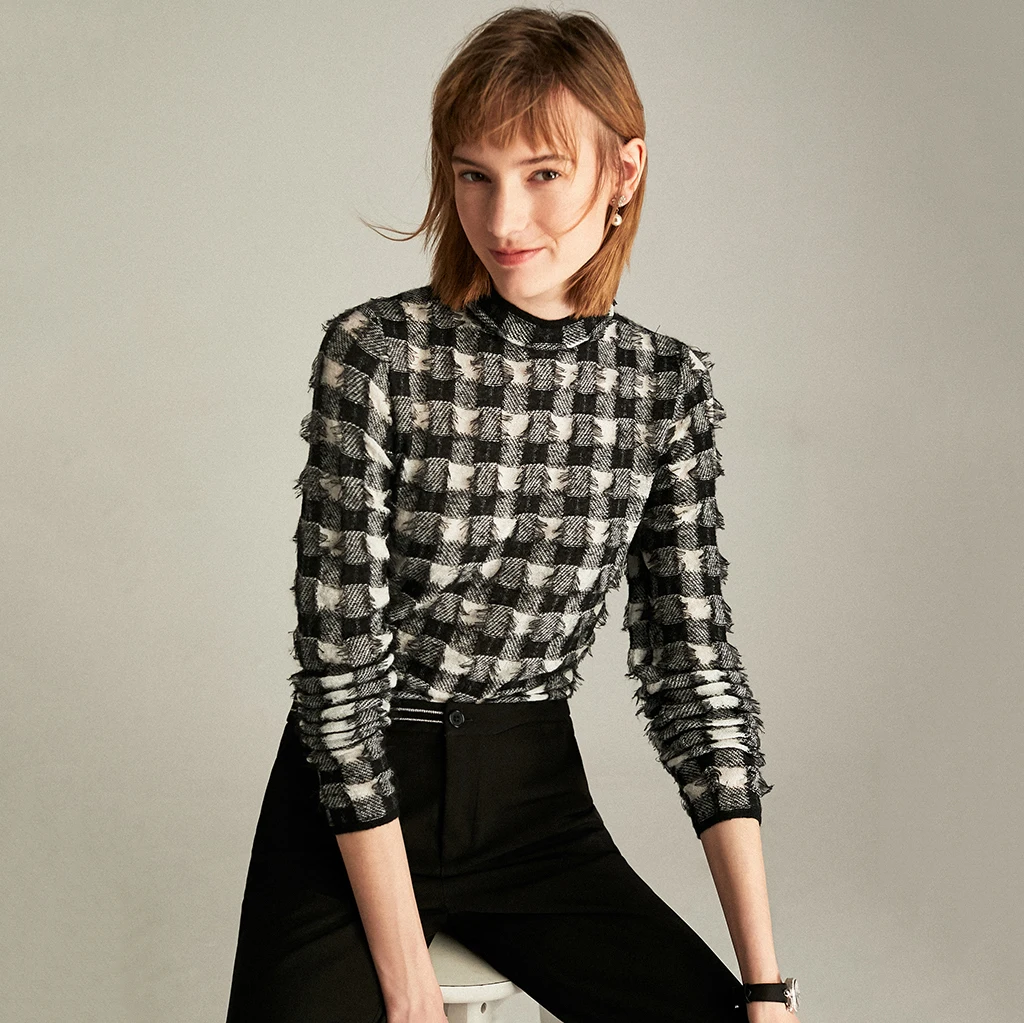 2019 fall and winter black and white plaid handmade tassel women high neck sweater
2019 fall and winter black and white plaid handmade tassel women high neck sweater