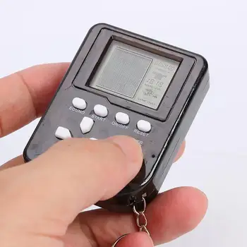 Retro Childhood LCD Tetris Game Console Keychain Mini Handheld 26 in 1 Game Player for Children Kids Educational Toy Gift 
Retro Childhood LCD Tetris Game Console Keychain Mini Handheld 26 in 1 Game Player for Children Kids Educational Toy Gift