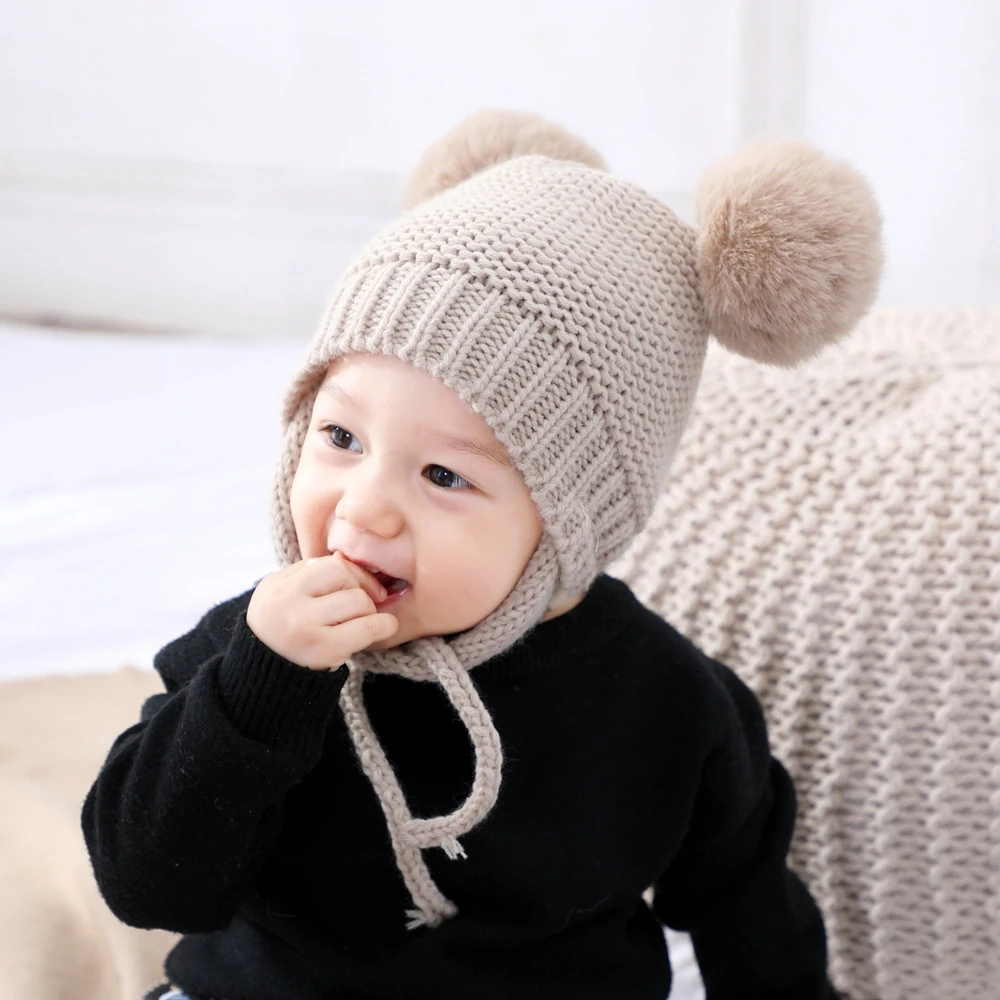 Фото Детская зимняя брендовая шапка 20 см с помпонами из натурального меха для женщин