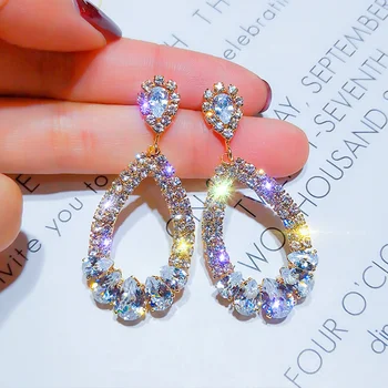 European and American simple geometric crystal earrings Korean temperament round drop-shaped Crystal earrings earrings
European and American simple geometric crystal earrings Korean temperament round drop-shaped Crystal earrings earrings
