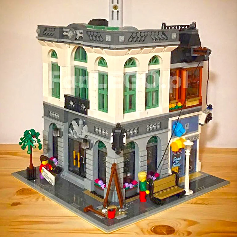 15001 In Stock Street View Brick bank Creator Series Model Building Blocks 2413Pcs Bricks Children toys Compatible With 10251
15001 In Stock Street View Brick bank Creator Series Model Building Blocks 2413Pcs Bricks Children toys Compatible With 10251