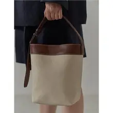 2021 New Women's Cool Simple Splicing Contrast Color Portable Canvas Bag Versatile Commuter Leisure Versatile Bucket Handbag
2021 New Women's Cool Simple Splicing Contrast Color Portable Canvas Bag Versatile Commuter Leisure Versatile Bucket Handbag