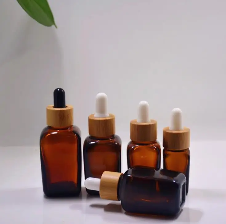 30ml amber square dropper glass bottle Eco-friendly bamboo white black cap Cosmetic essential oil Container packaging SN283
30ml amber square dropper glass bottle Eco-friendly bamboo white black cap Cosmetic essential oil Container packaging SN283