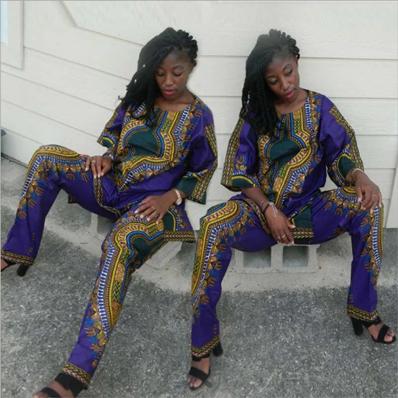 New Summer African Clothing Women Two Pieces Set Traditional Print Outfit Half Sleeve Loose Casual Dashiki Dress Long Pants Suit
New Summer African Clothing Women Two Pieces Set Traditional Print Outfit Half Sleeve Loose Casual Dashiki Dress Long Pants Suit