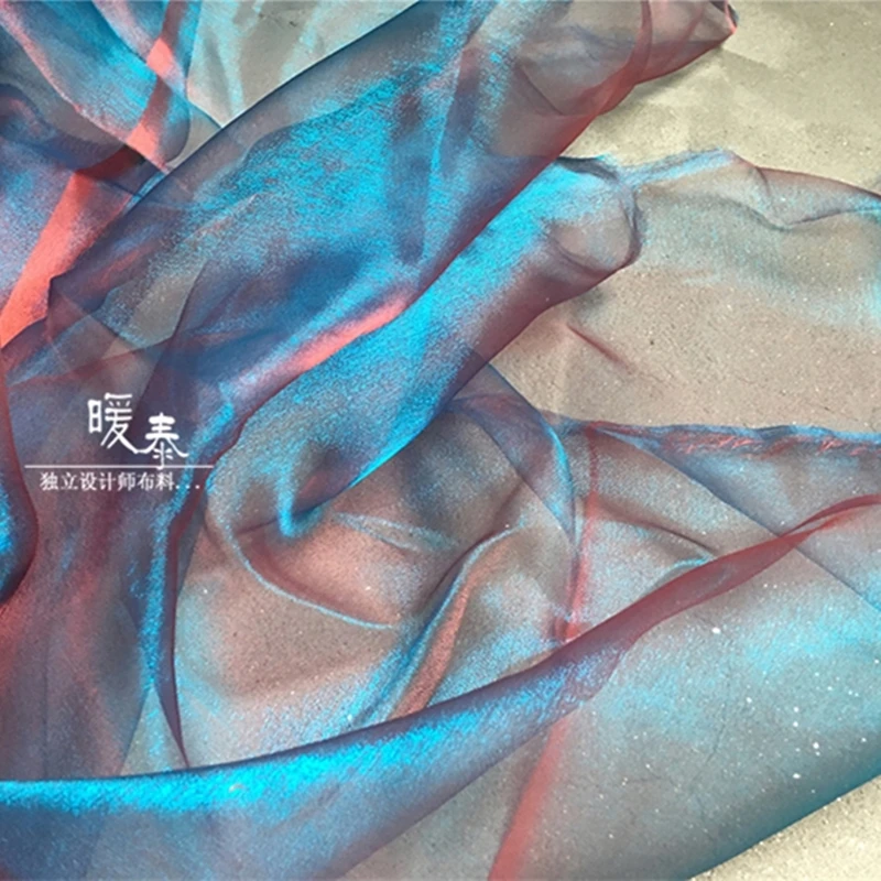 High-end Tulle Fabric Blue Red Change Hazy feeling Gloss DIY Veil Flower Background Decor Hanfu Dress Fashion Designer Fabric
High-end Tulle Fabric Blue Red Change Hazy feeling Gloss DIY Veil Flower Background Decor Hanfu Dress Fashion Designer Fabric