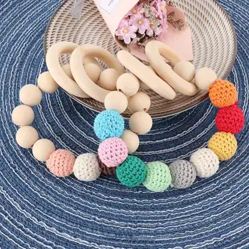 1pcs Baby Teether Organic Wooden Ring Beads Teether Natural Teething Grasping Toys Toddler Teether Newborn DIY Baby Gifts
1pcs Baby Teether Organic Wooden Ring Beads Teether Natural Teething Grasping Toys Toddler Teether Newborn DIY Baby Gifts