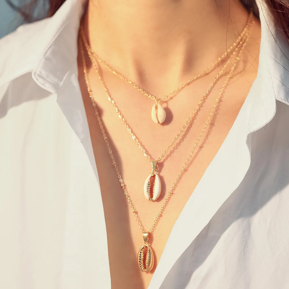 Women fashion style personality geometric shell conch pendant multi-layer alloy necklace
Women fashion style personality geometric shell conch pendant multi-layer alloy necklace