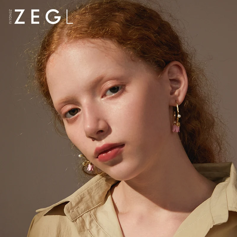 ZEGL Designer Dutch scenery series double C stud earrings female temperament simple flower earrings ear jewelry 
ZEGL Designer Dutch scenery series double C stud earrings female temperament simple flower earrings ear jewelry