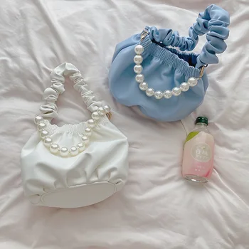 Ladies 2020 bag Pearl Chic fold Soft leather Cloud bag Fashion ring Portable Bucket bag Fashion wild Messenger bag Small fresh
Ladies 2020 bag Pearl Chic fold Soft leather Cloud bag Fashion ring Portable Bucket bag Fashion wild Messenger bag Small fresh