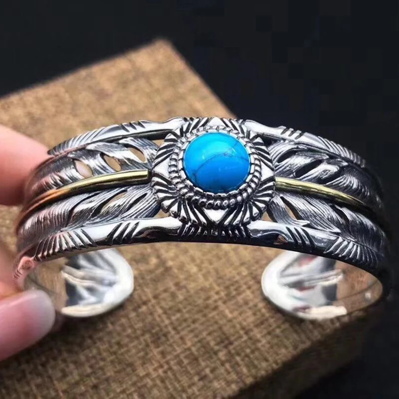 925 sterling Silver color Hollow out Ethnic Indian Style Thai silver color Inlaid Turquoise Feather Bracelet Bangle Jewelry
925 sterling Silver color Hollow out Ethnic Indian Style Thai silver color Inlaid Turquoise Feather Bracelet Bangle Jewelry