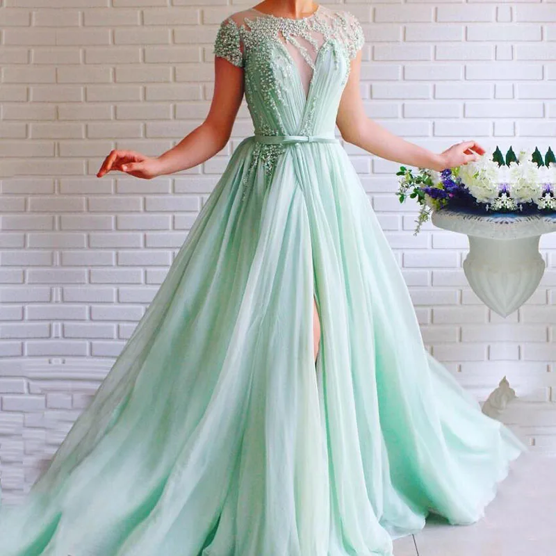 Mint Green Prom Dress O-Neck Cap Sleeves Beaded with Pearls A-Line Tulle Sashes Backless Long Formal Evening Gown for Party
Mint Green Prom Dress O-Neck Cap Sleeves Beaded with Pearls A-Line Tulle Sashes Backless Long Formal Evening Gown for Party