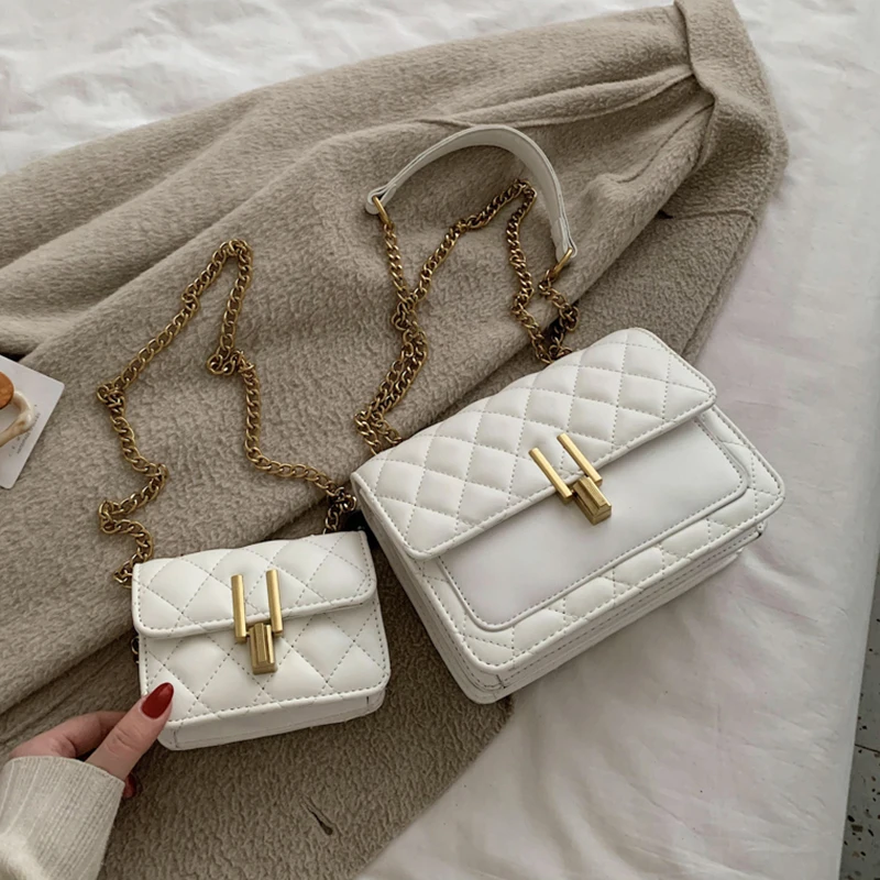 2020 Women's Shoulder Bag Small Fragrance Temperament Crossbody Bag New Fashion Wild Rhombus Chain Lock Small Square Bag L0UIS
2020 Women's Shoulder Bag Small Fragrance Temperament Crossbody Bag New Fashion Wild Rhombus Chain Lock Small Square Bag L0UIS