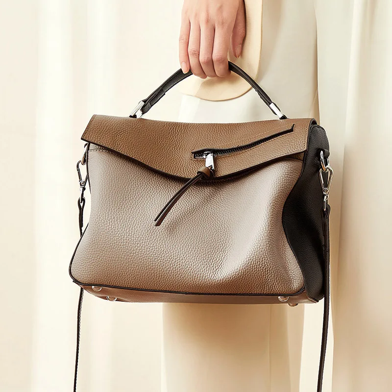 Real leather lady's bag 2020 new simple cowhide bag Korean version soft leather one shoulder slung bag hit color
Real leather lady's bag 2020 new simple cowhide bag Korean version soft leather one shoulder slung bag hit color
