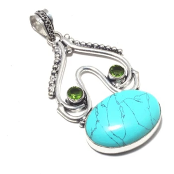 Turquoise Silver Overlay on Copper Pendant hand made women Jewelry gift
Turquoise Silver Overlay on Copper Pendant hand made women Jewelry gift