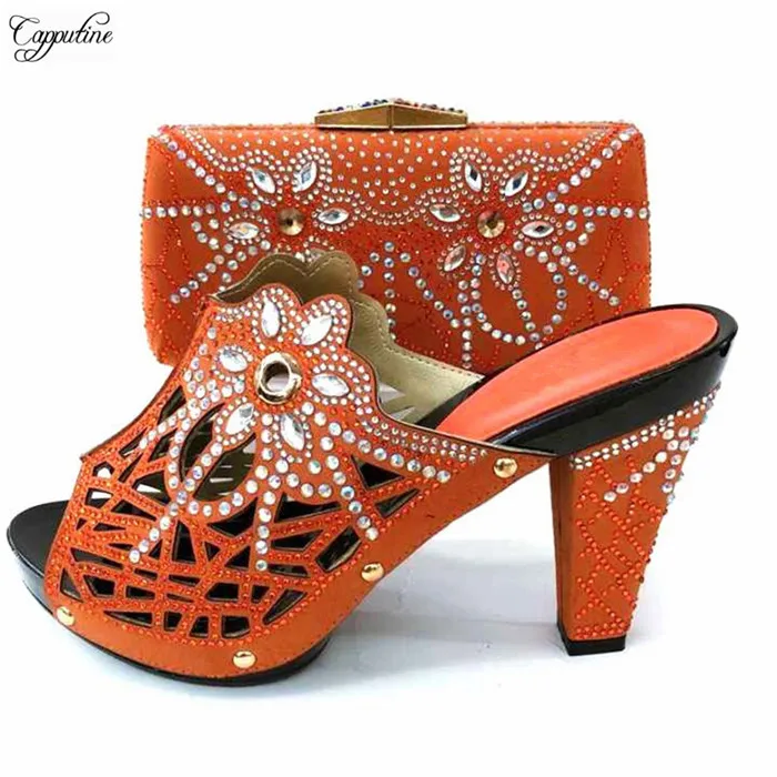 Pretty orange with crystal stones high heel shoes and evening bag set 667-2 heel height 11.2cm
Pretty orange with crystal stones high heel shoes and evening bag set 667-2 heel height 11.2cm