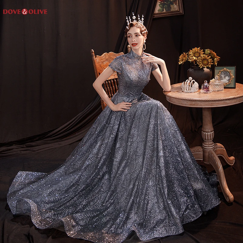 Silver Evening Dresses Long Bling Sequined 2020 High Neck Cap Sleeve A Line Floor Length Keyhole Back Lace up Prom Gown Women
Silver Evening Dresses Long Bling Sequined 2020 High Neck Cap Sleeve A Line Floor Length Keyhole Back Lace up Prom Gown Women