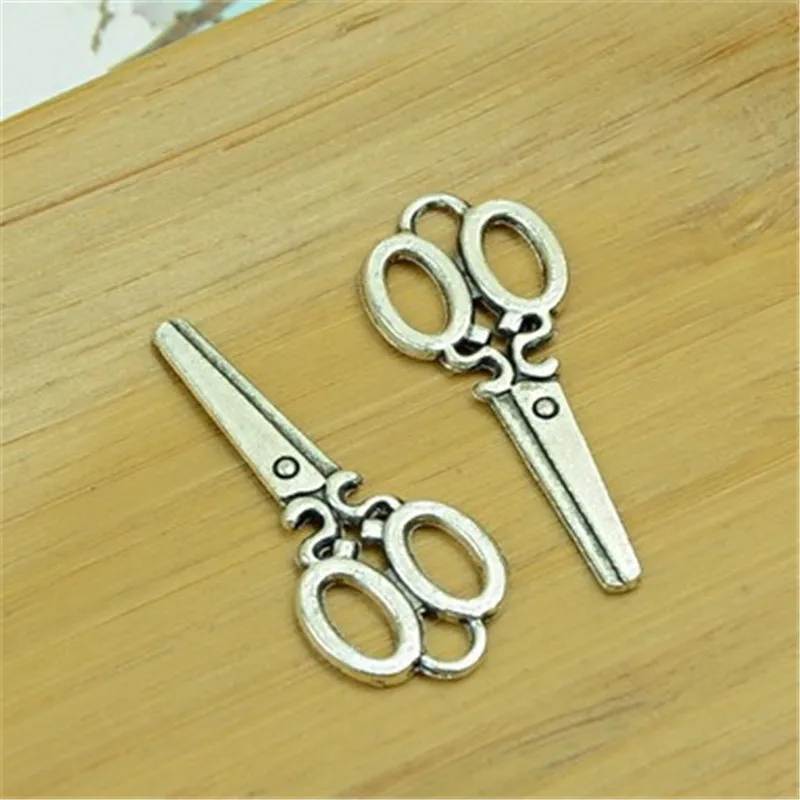 100Pcs/lot Antique Silver Scissors Charms 14x34MM Metal Tool Charms for Jewelry Making
100Pcs/lot Antique Silver Scissors Charms 14x34MM Metal Tool Charms for Jewelry Making