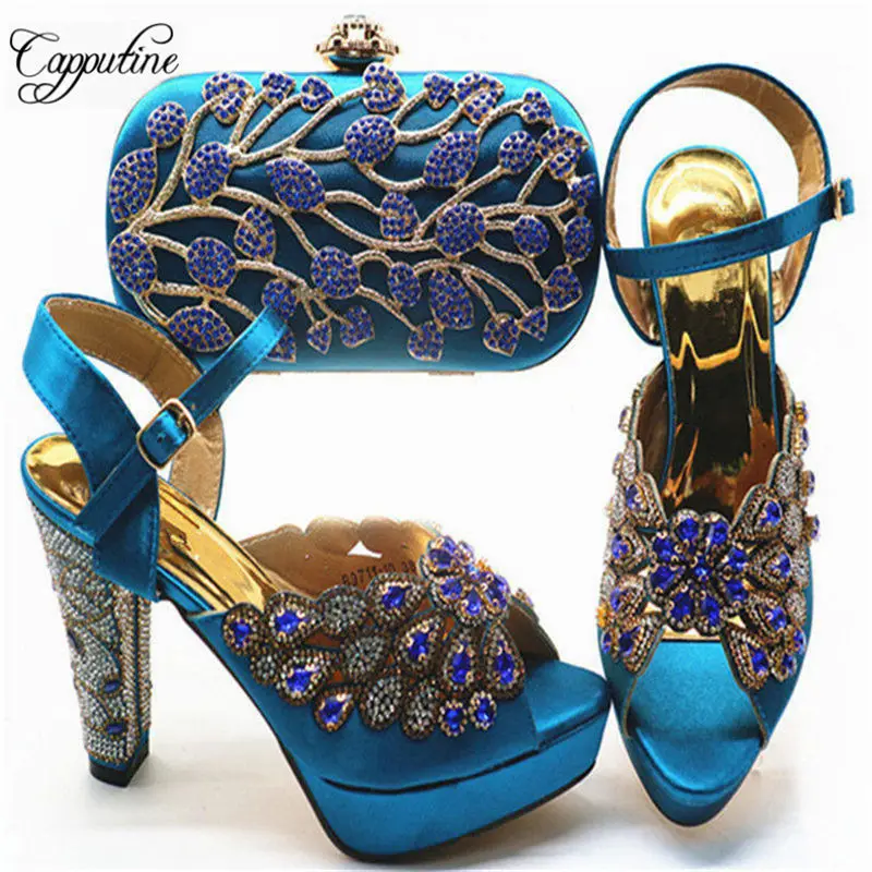Capputine Latest Design High Quality Crystal Shoes And Bag Set For Party Nigerian Spike Heels Shoes And Bag Set Large Size 38-43
Capputine Latest Design High Quality Crystal Shoes And Bag Set For Party Nigerian Spike Heels Shoes And Bag Set Large Size 38-43